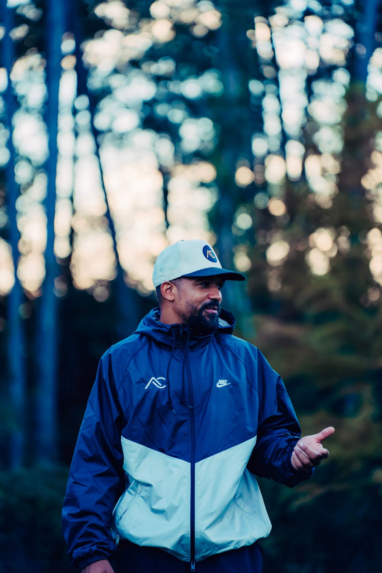 Athlete Collective coach on the outdoor training turf
